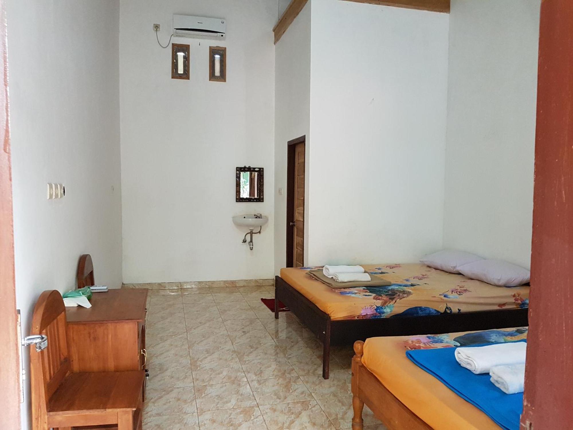 Red Island Bungalows Pasanggaran Phòng bức ảnh